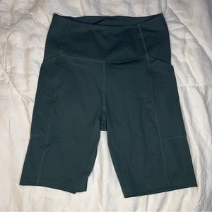 NWOT Girlfriend Collective green bike shorts size M